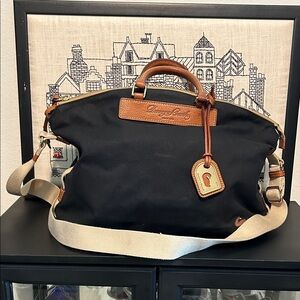 Dooney & Bourke Black Canvas Duffel with Tan Leather Trim